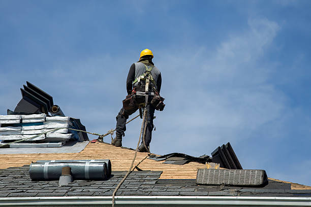 Professional Roof Replacement technician working in Clare, MI